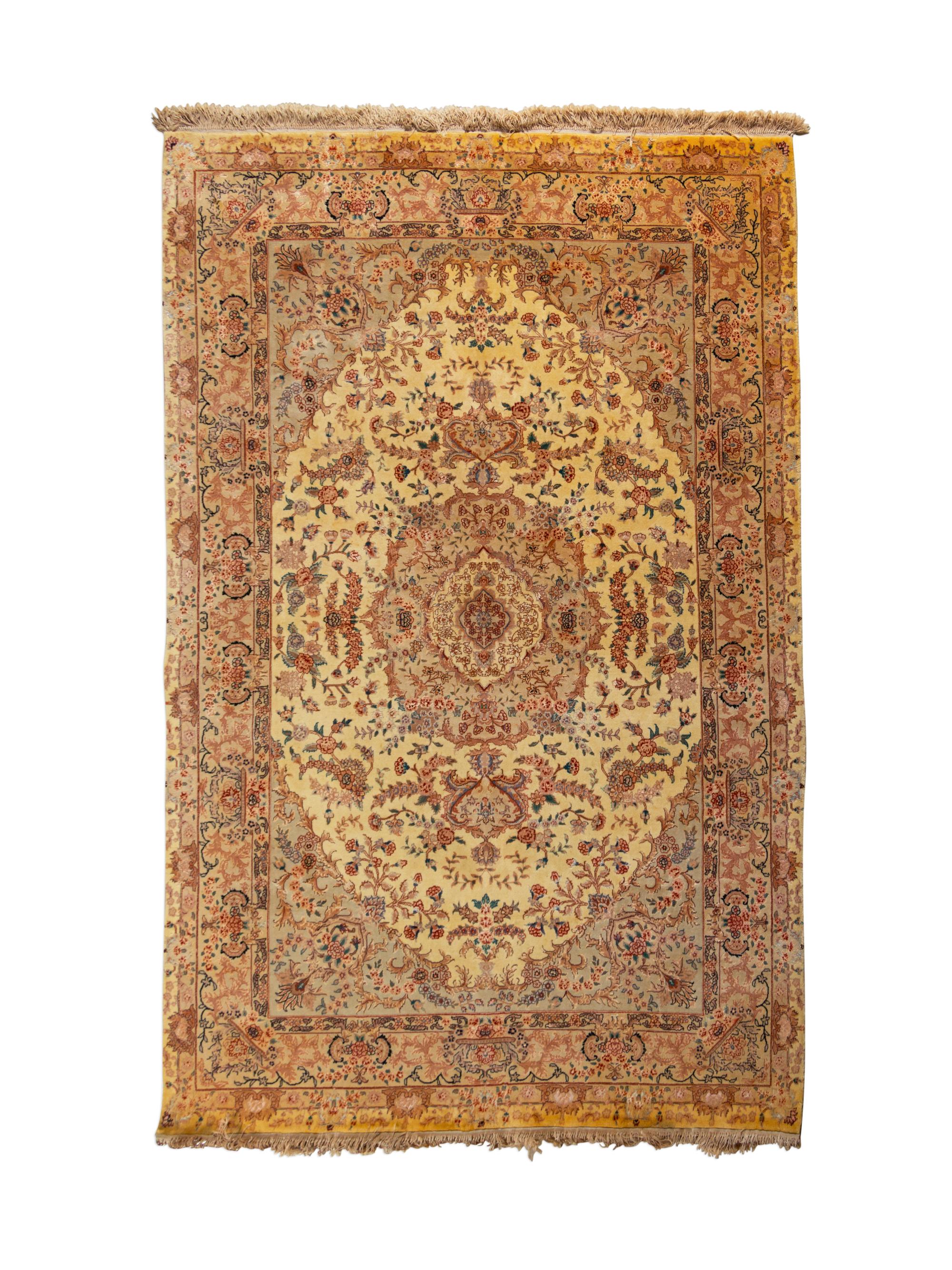 A Tabriz Wool Rug