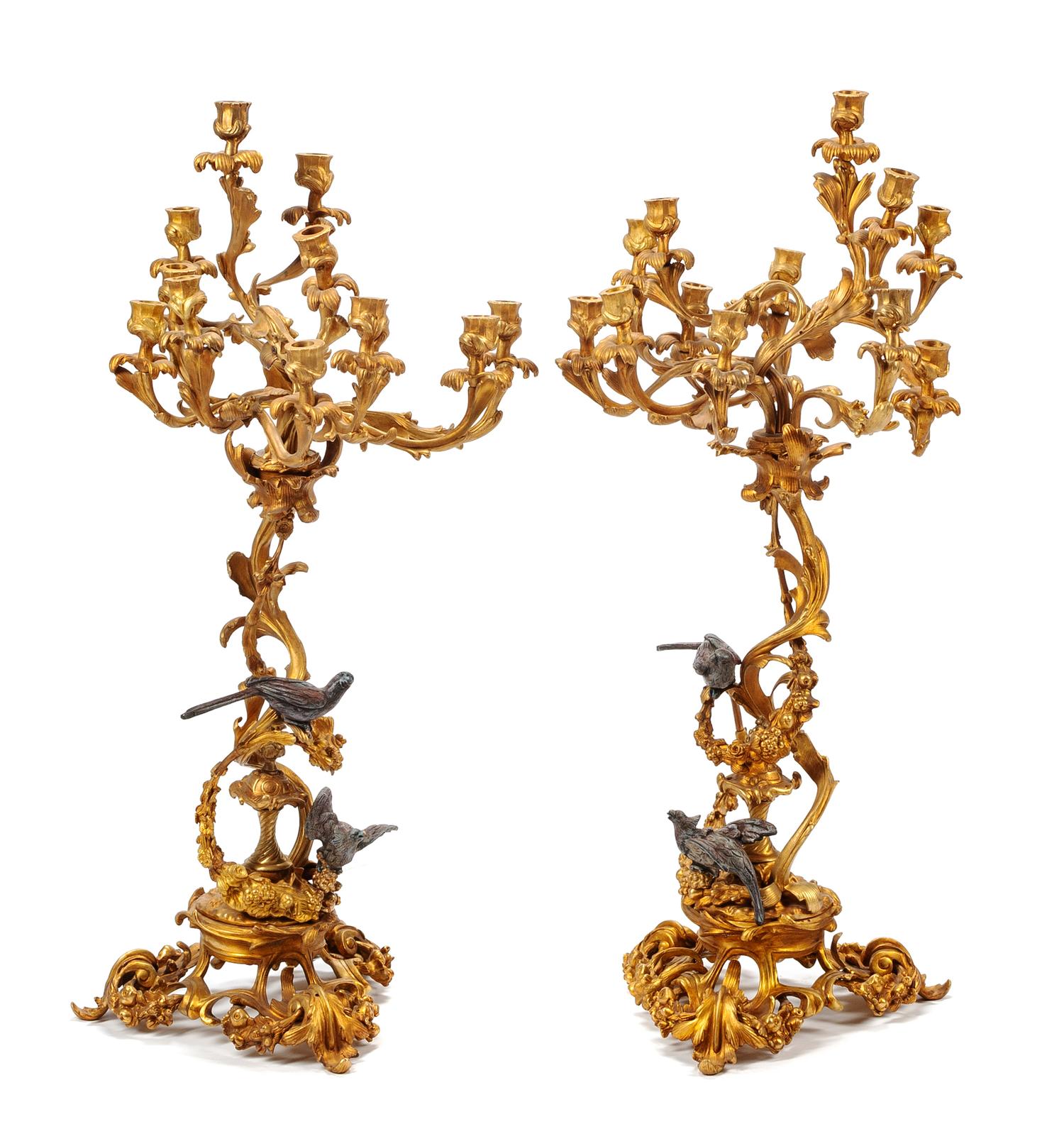 A Pair of Louis XV Style Gilt and Patinated Bronze Twelve-Light Candelabra