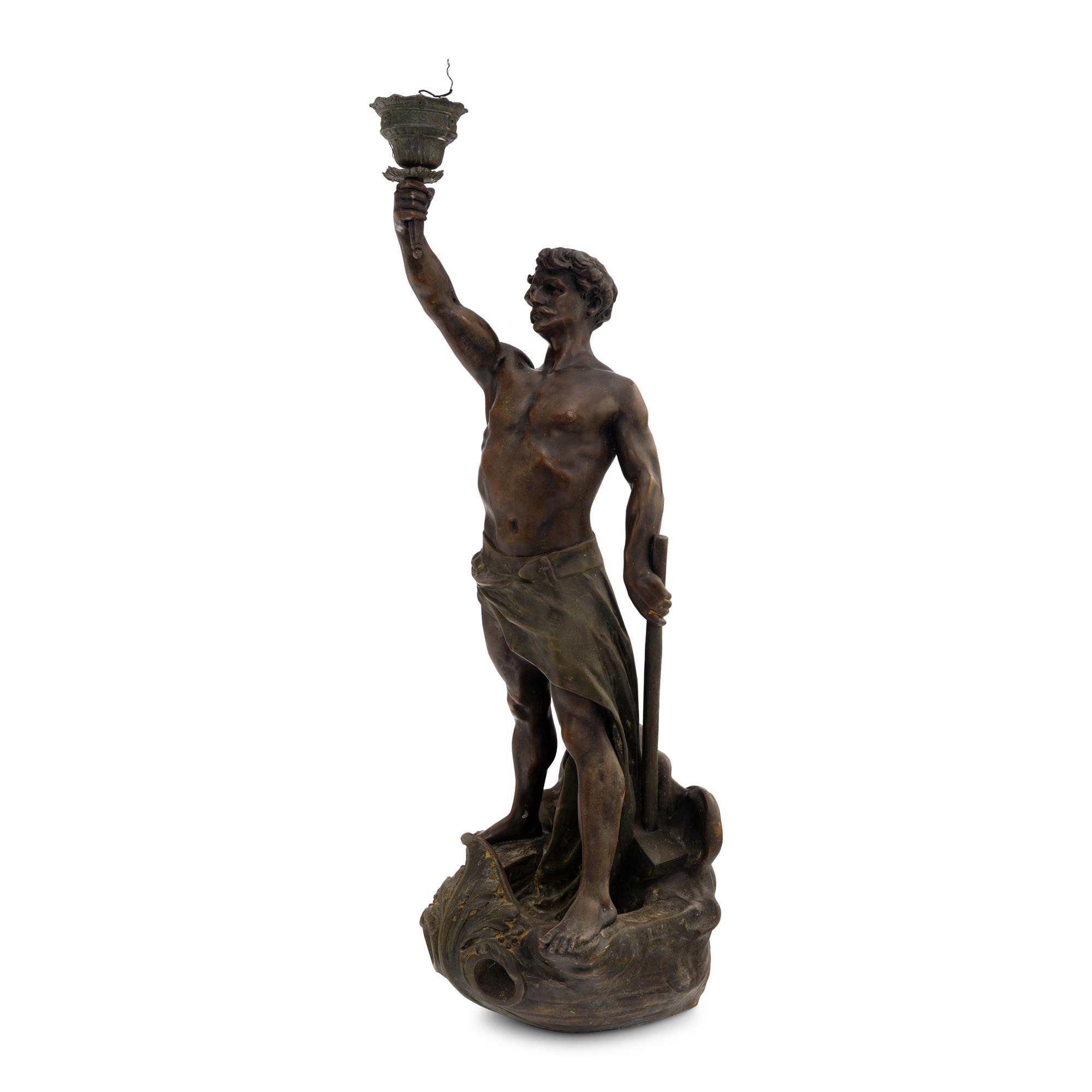 A Cast Metal Figural Newel Post Lamp