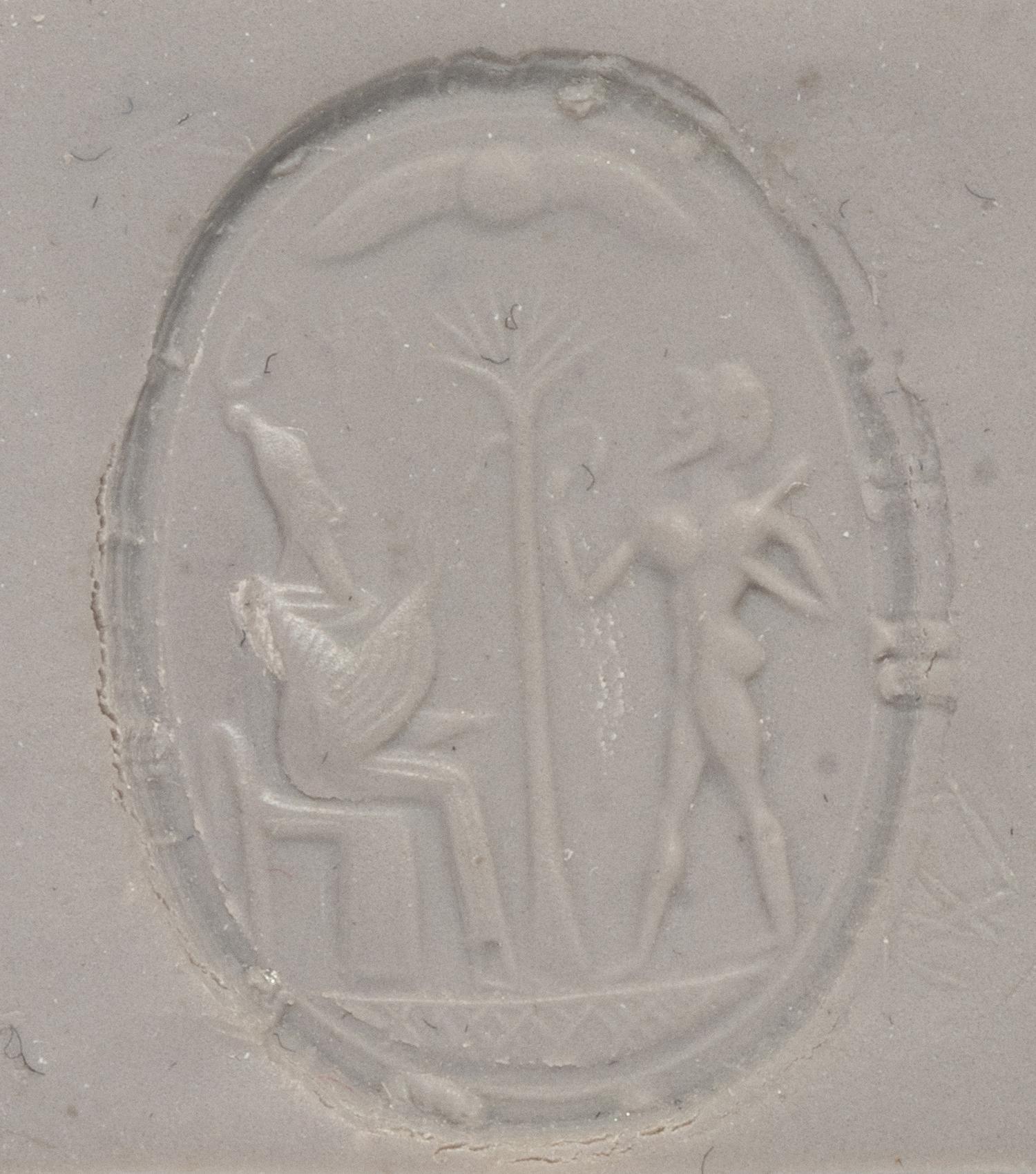 A Phoenician Carnelian Scaraboid with a Seated King and Hero