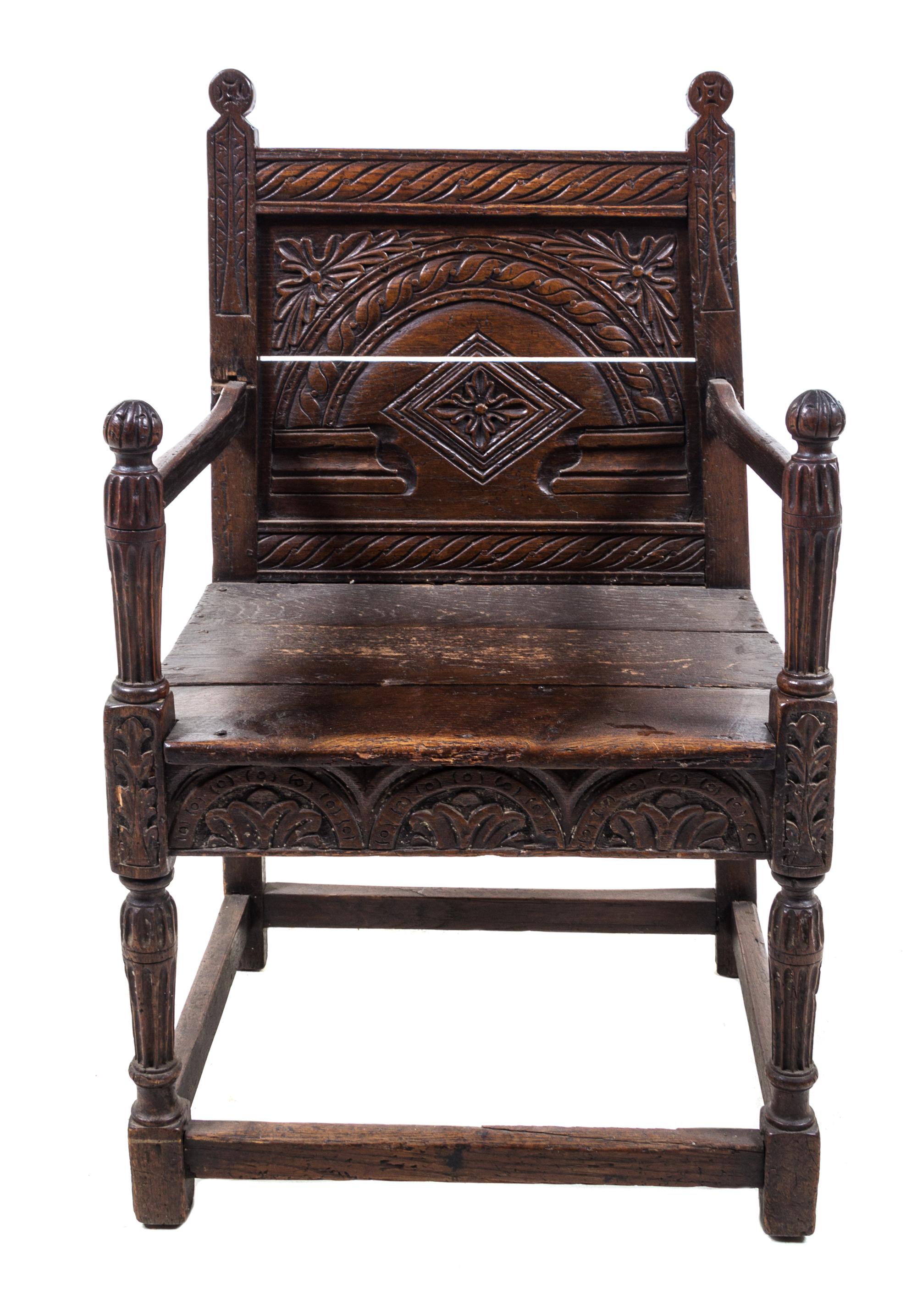 A Jacobean Oak Armchair Height 38 3/4 inches. — 17TH CENTURY