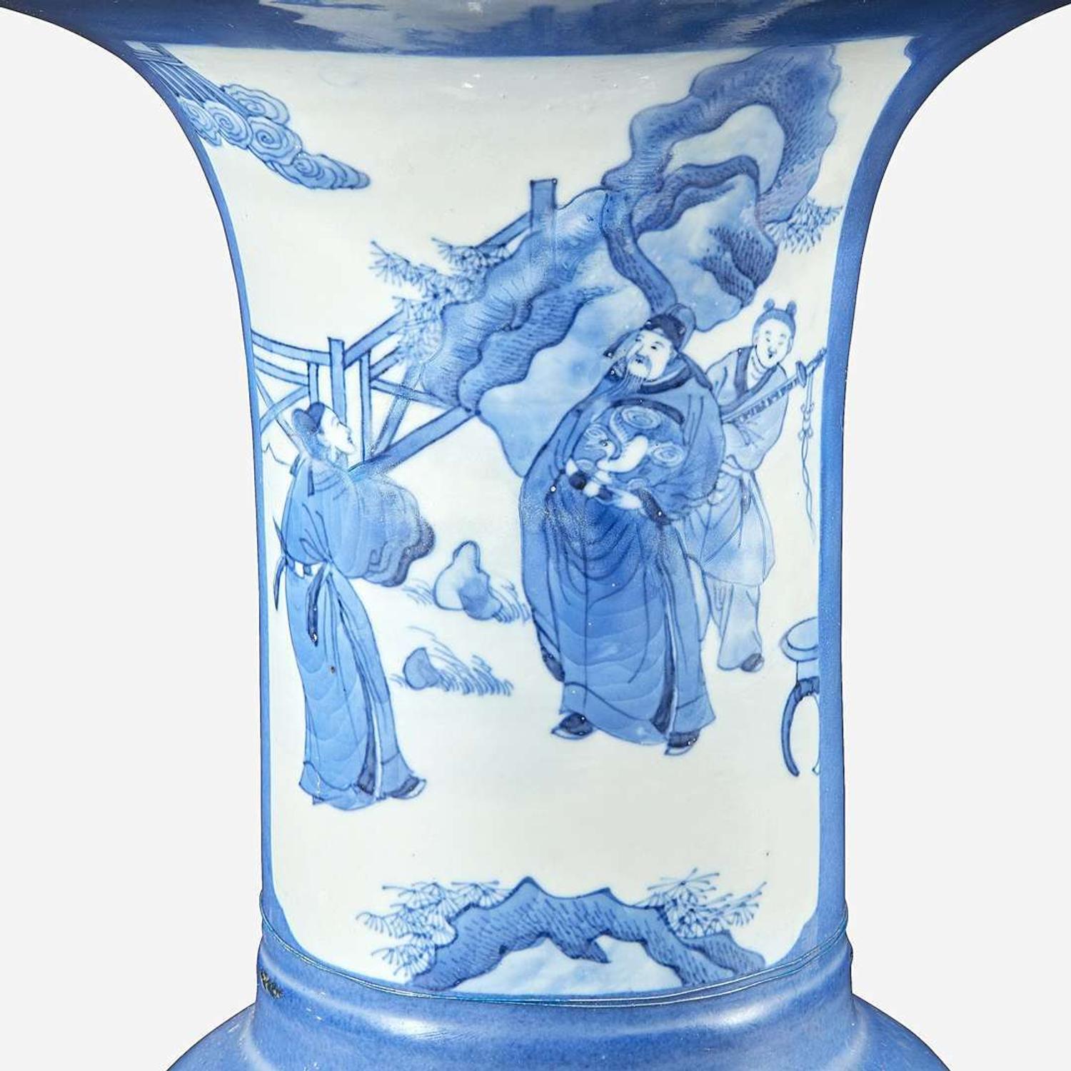 A pair of Chinese blue and white powder-blue ground “Phoenix-tail” vases mounted as lamps Kangxi style