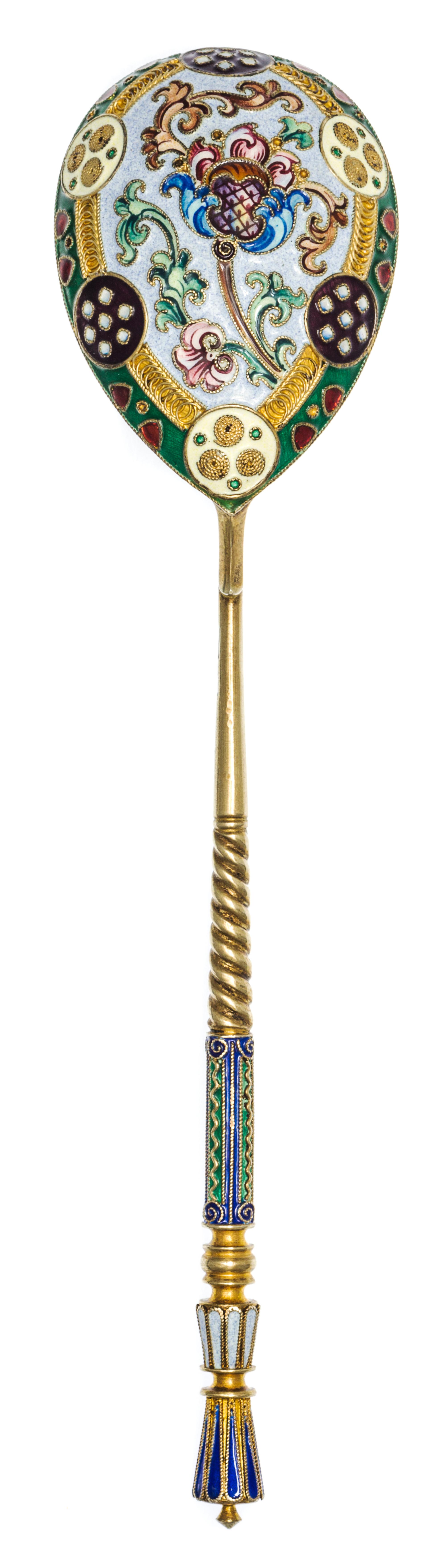 A Russian Silver-Gilt and Enamel Spoon, Mark of 11th Artel, Moscow, early 20th century, having a blue enameled finial, the underside of
