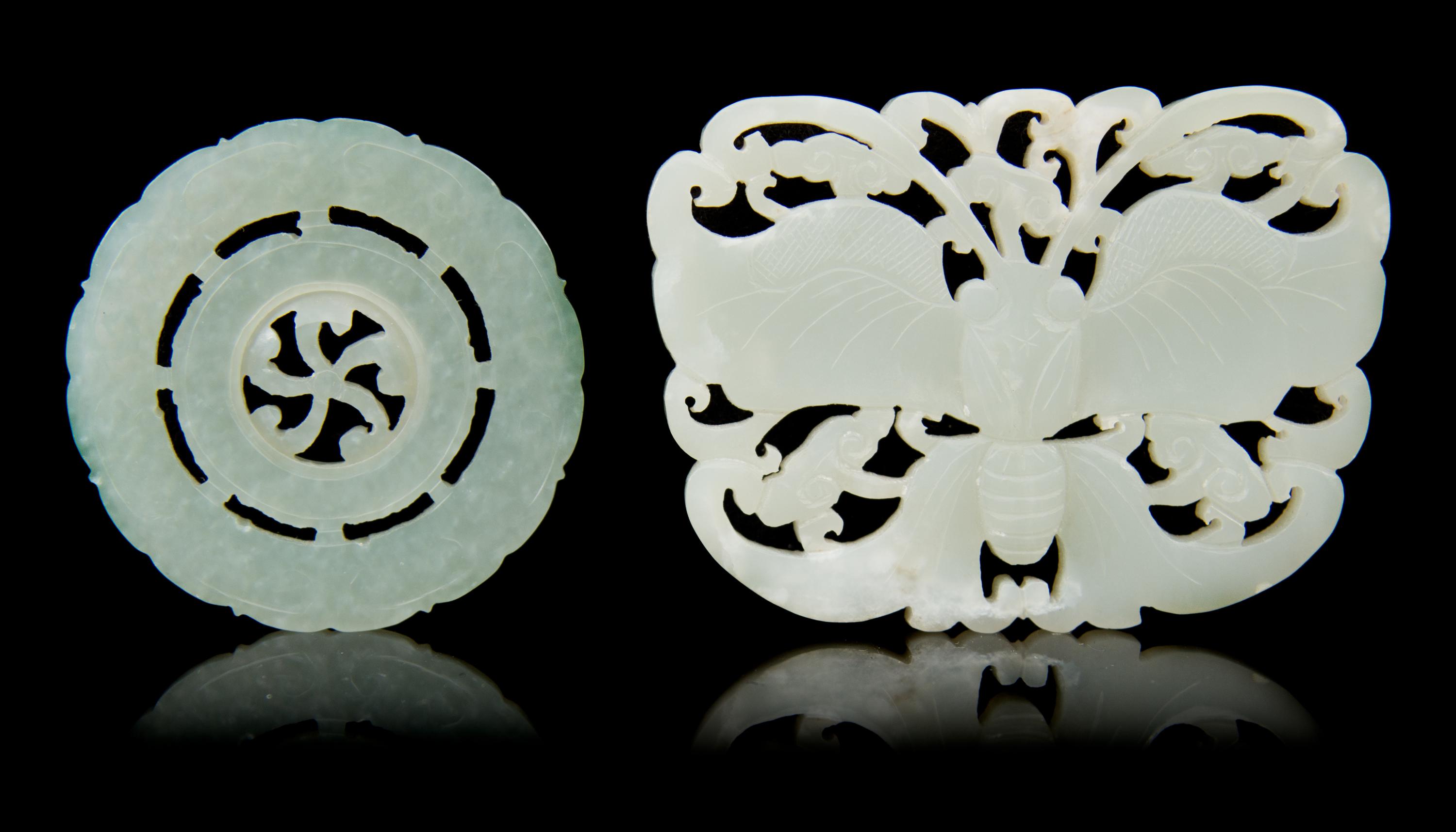 Two Carved Jade Pendants Length of first 3 inches.