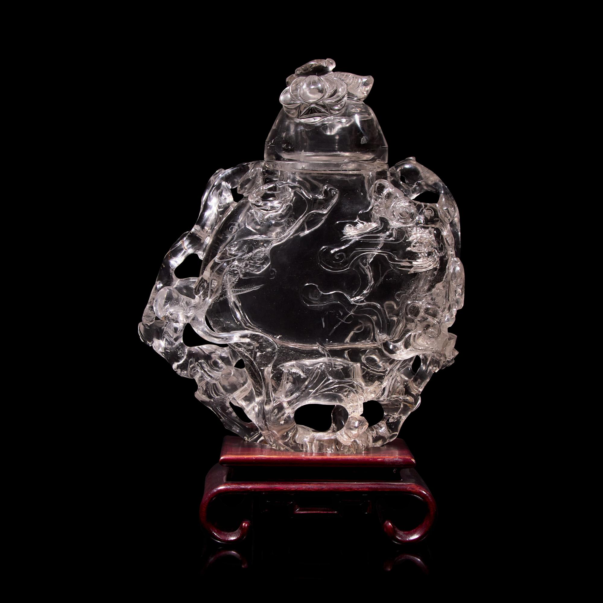 A Chinese Rock Crystal Vase and Cover Carved with Clouds, 20th Century 近代 高浮雕螭龍紋水晶扁壺