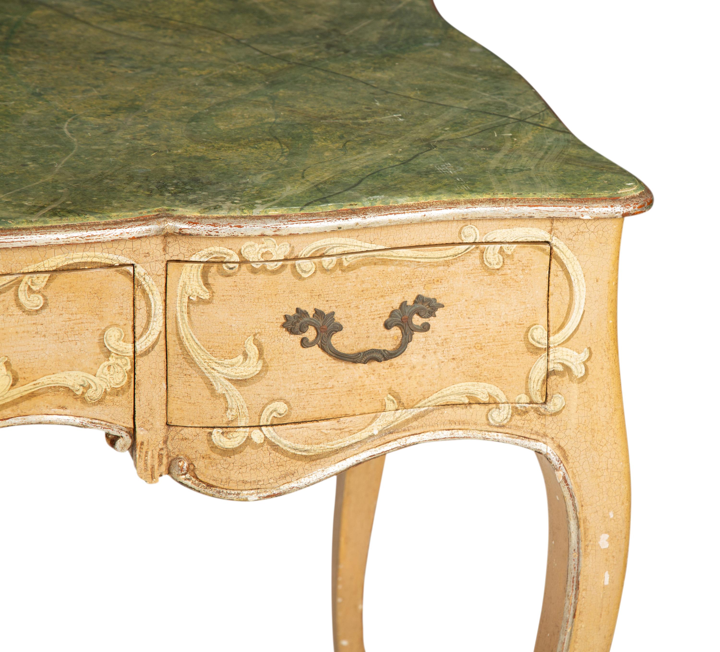 An Italian Painted and Parcel Gilt Writing Table with Faux Marble Top
