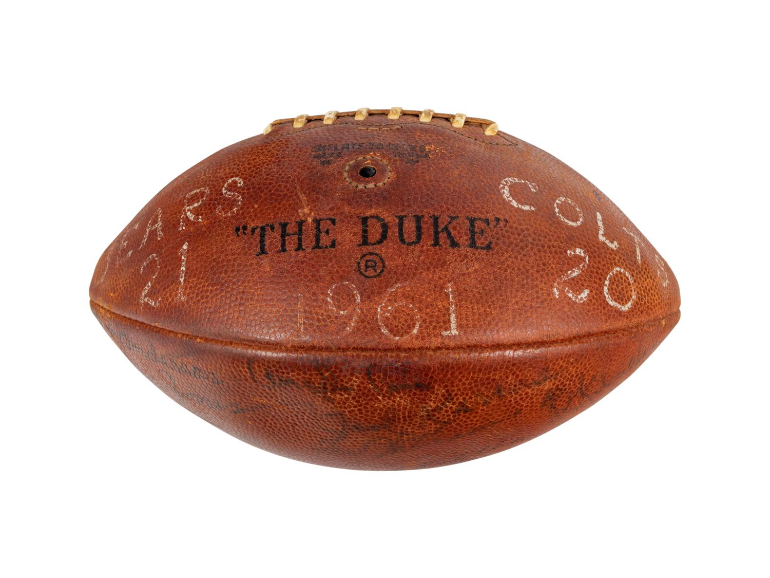 A 1961 Chicago Bears vs. Baltimore Colts Team-Signed Autograph Game Ball Presented to Mike Ditka Formerly Displayed at Mike Ditka's Restaurant