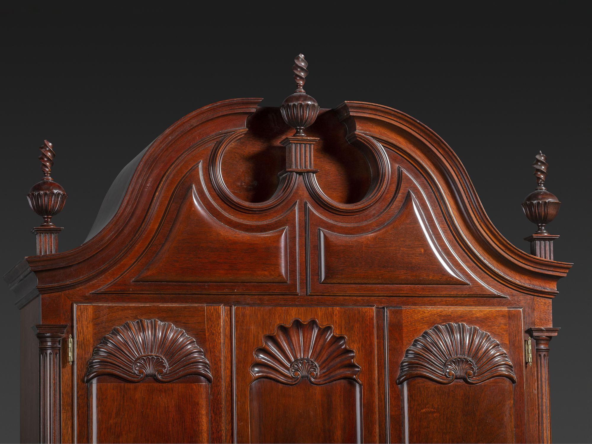 A Kindel Chippendale Revival Shell-and-Block Front Desk-and-Bookcase