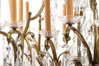 A French Gilt Metal and Glass Twenty-Light Chandelier