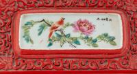 A Chinese Porcelain-Inset Red Lacquer Box