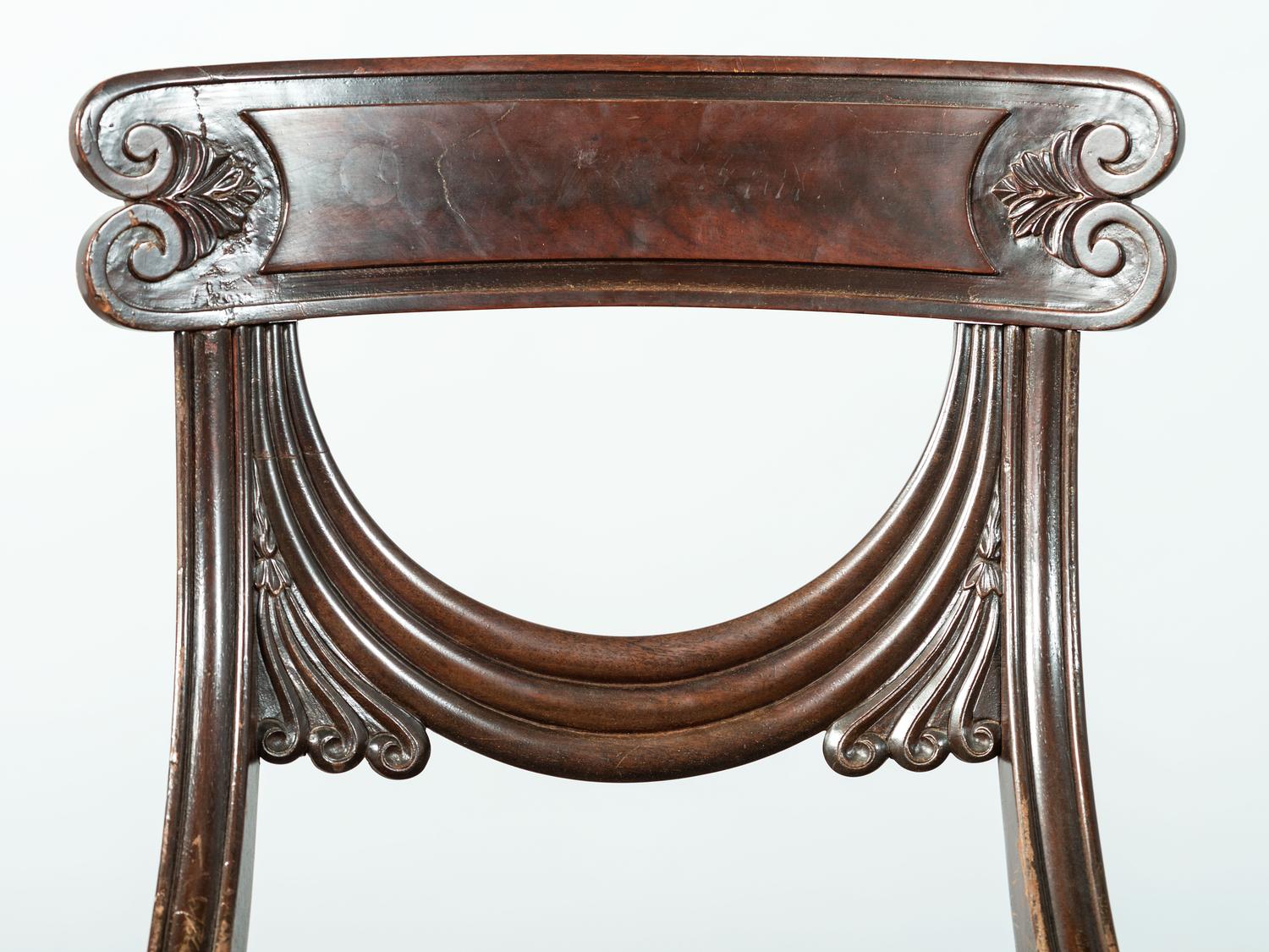 A Pair of Classical Drapery Carved Mahogany Side Chairs
