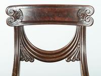 A Pair of Classical Drapery Carved Mahogany Side Chairs