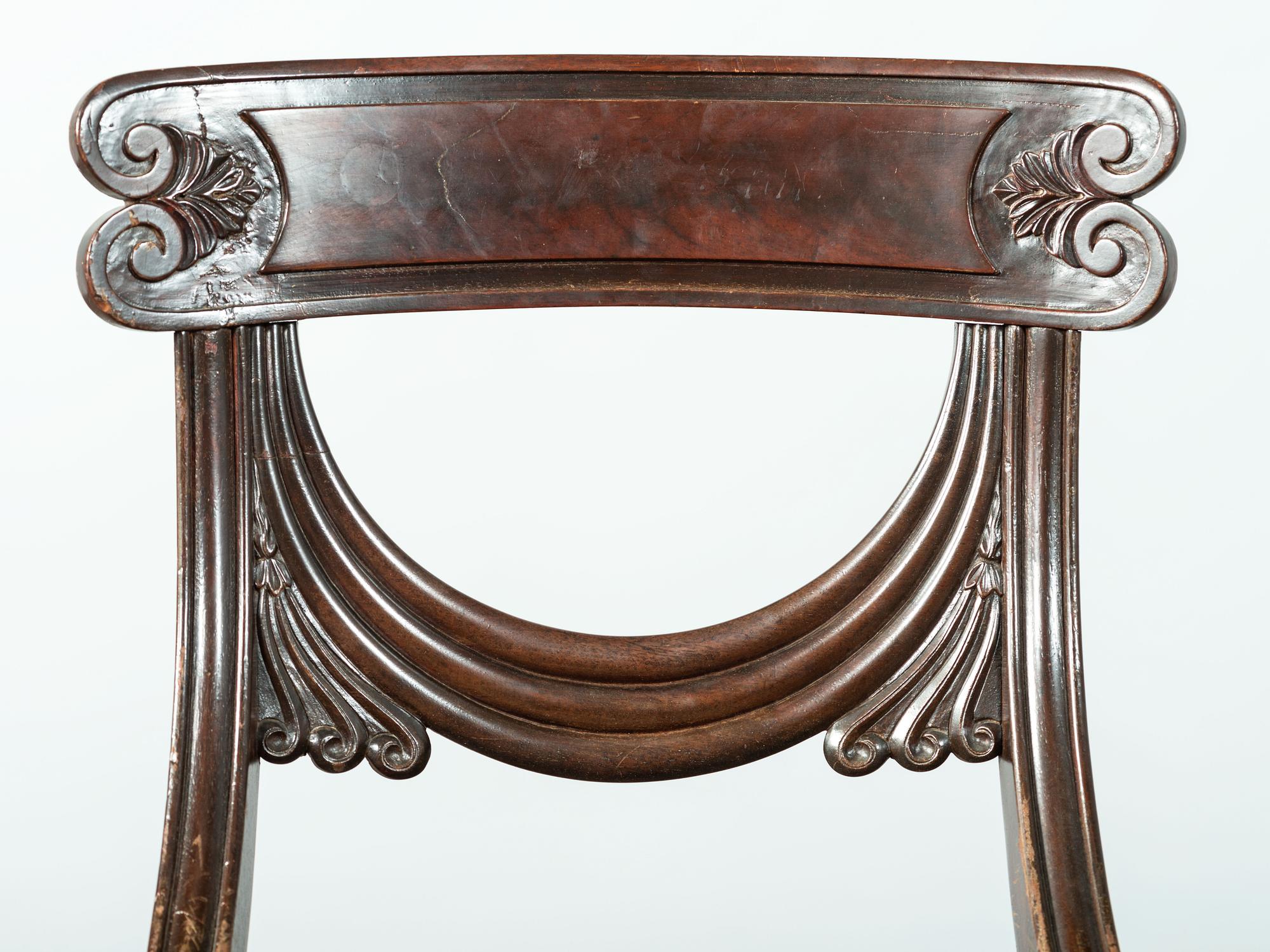 A Pair of Classical Drapery Carved Mahogany Side Chairs