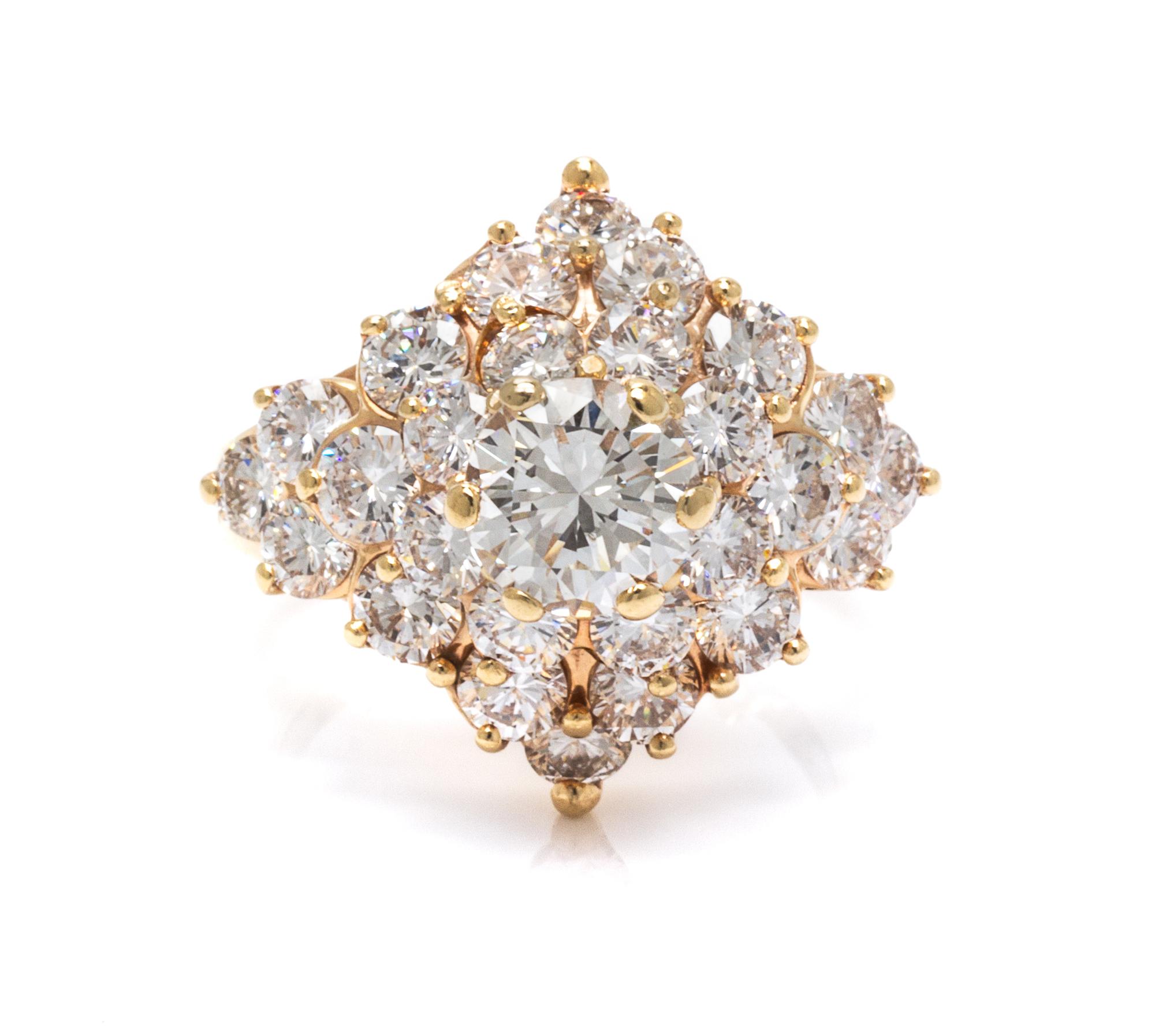 A 14 Karat Yellow Gold and Diamond Cluster Ring,