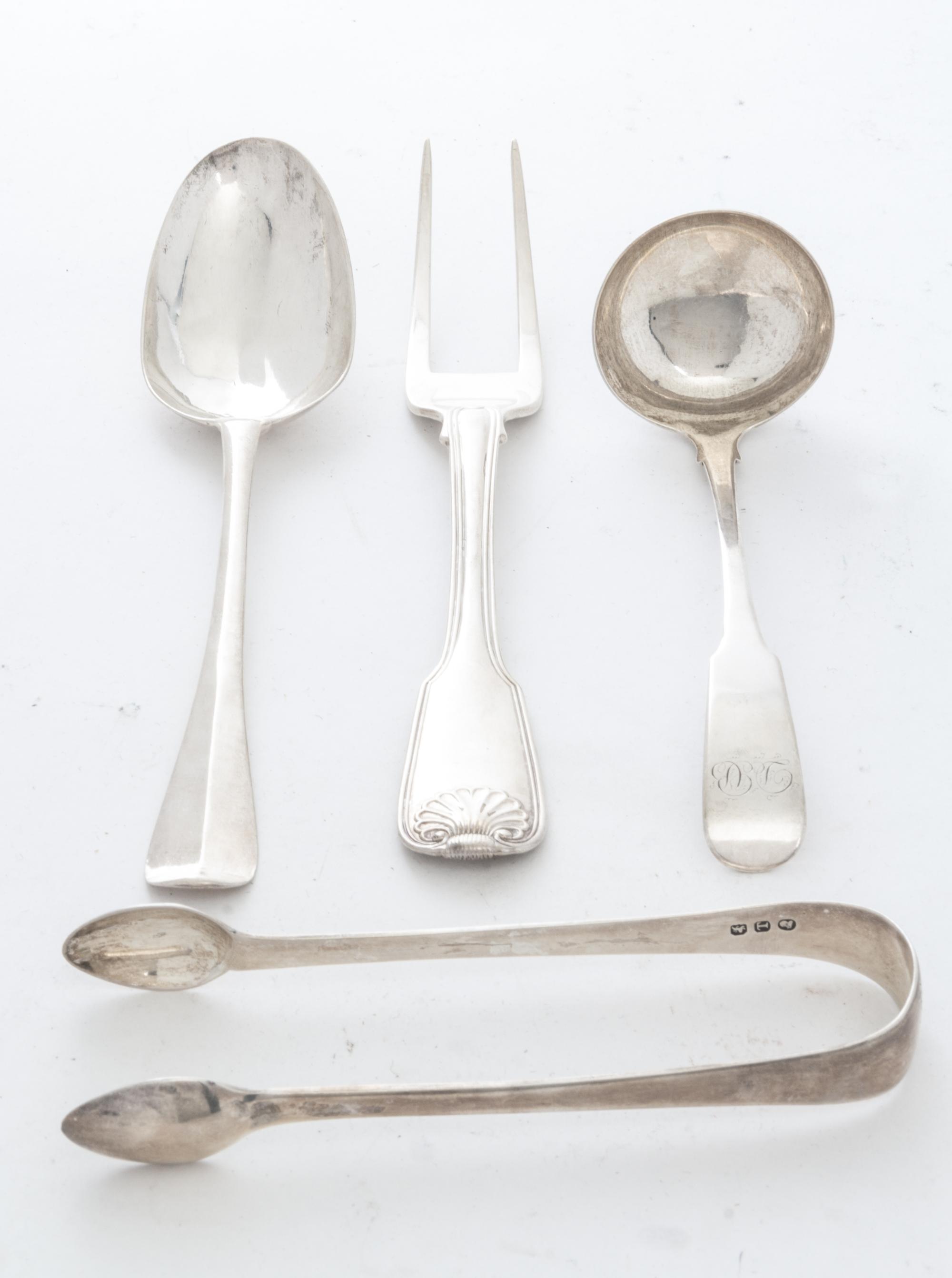 Four English Silver Serving Articles, various makers and dates, London, comprising a table spoon, carving fork, sugar tongs and a sauce