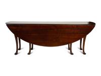 A Queen Anne Style Mahogany Gate-Leg Drop Leaf Dining Table — 20TH CENTURY