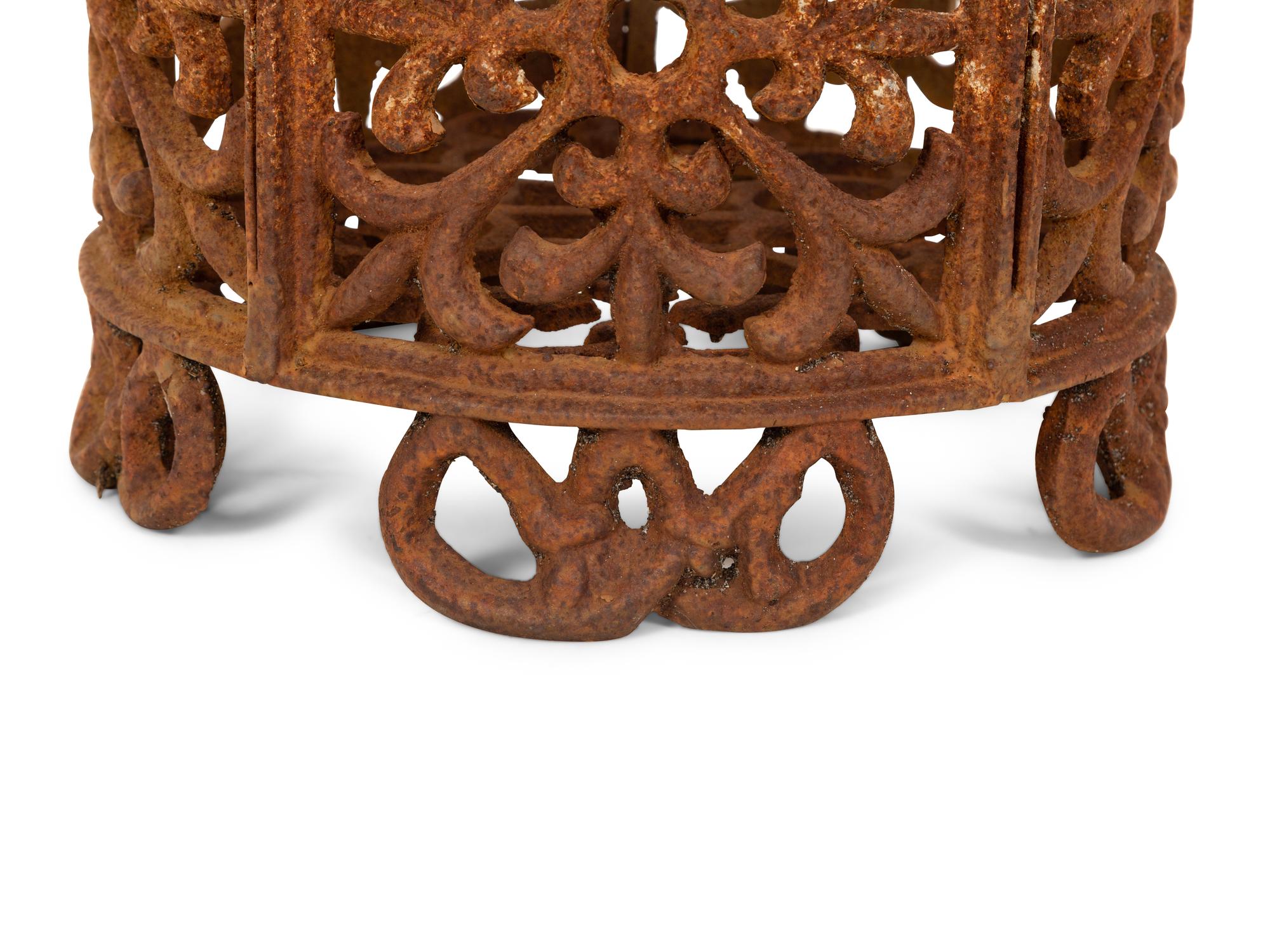An Iron Jardinière Holder