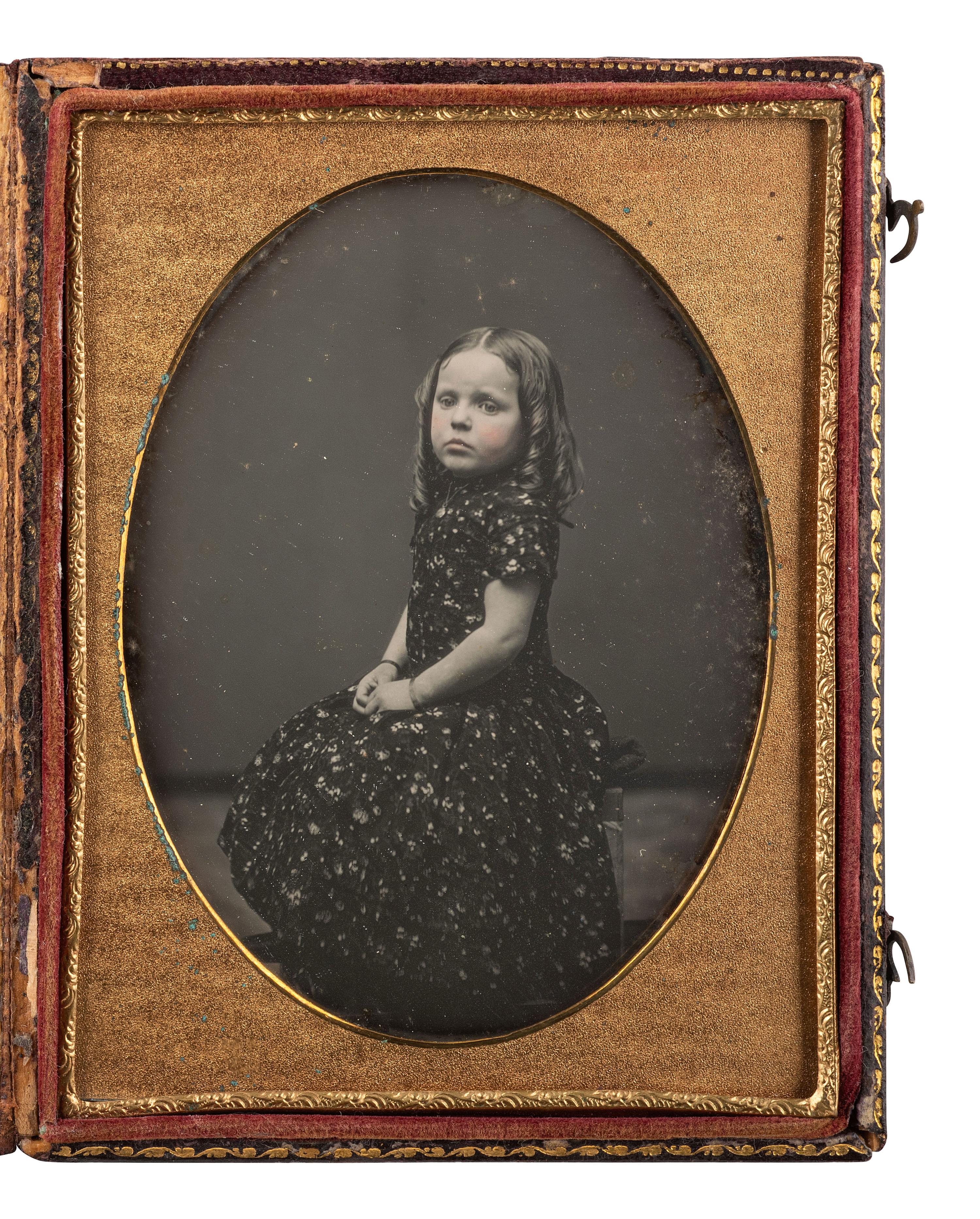 [EARLY PHOTOGRAPHY]. Two quarter plate daguerreotypes of young children posed in studio settings.