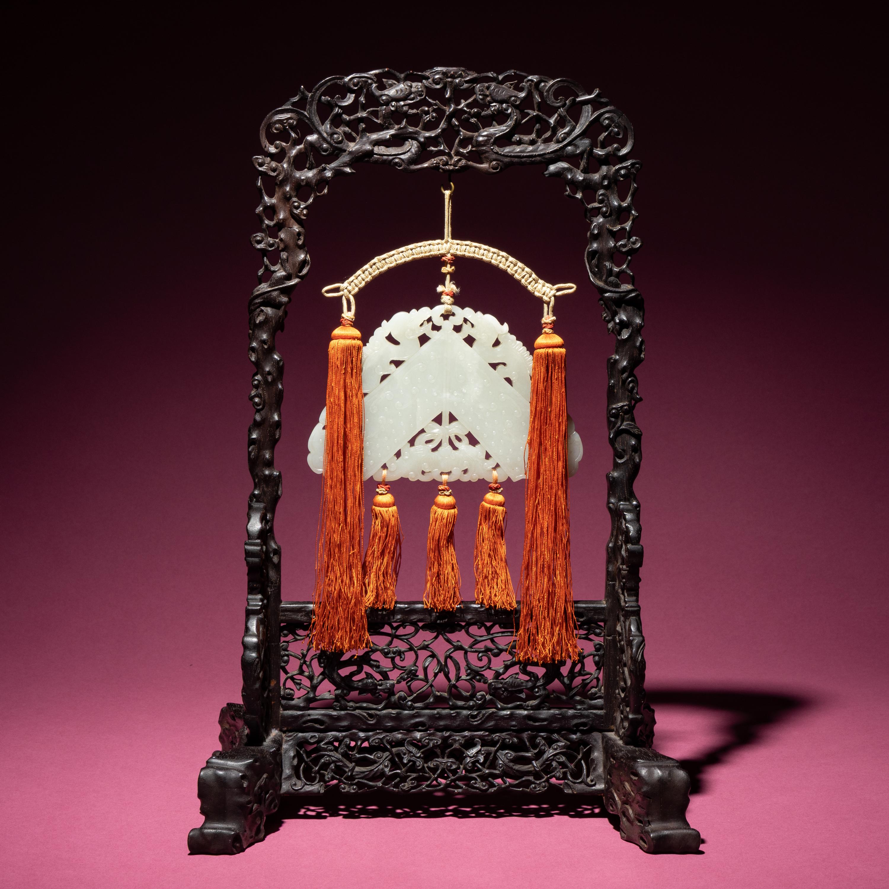 A Chinese White Jade Chime-Form Pendant, 18th/19th Century — 清中期 白玉罄
