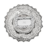 A Group of Four S. Kirk and Son Repousse Silver Table Articles