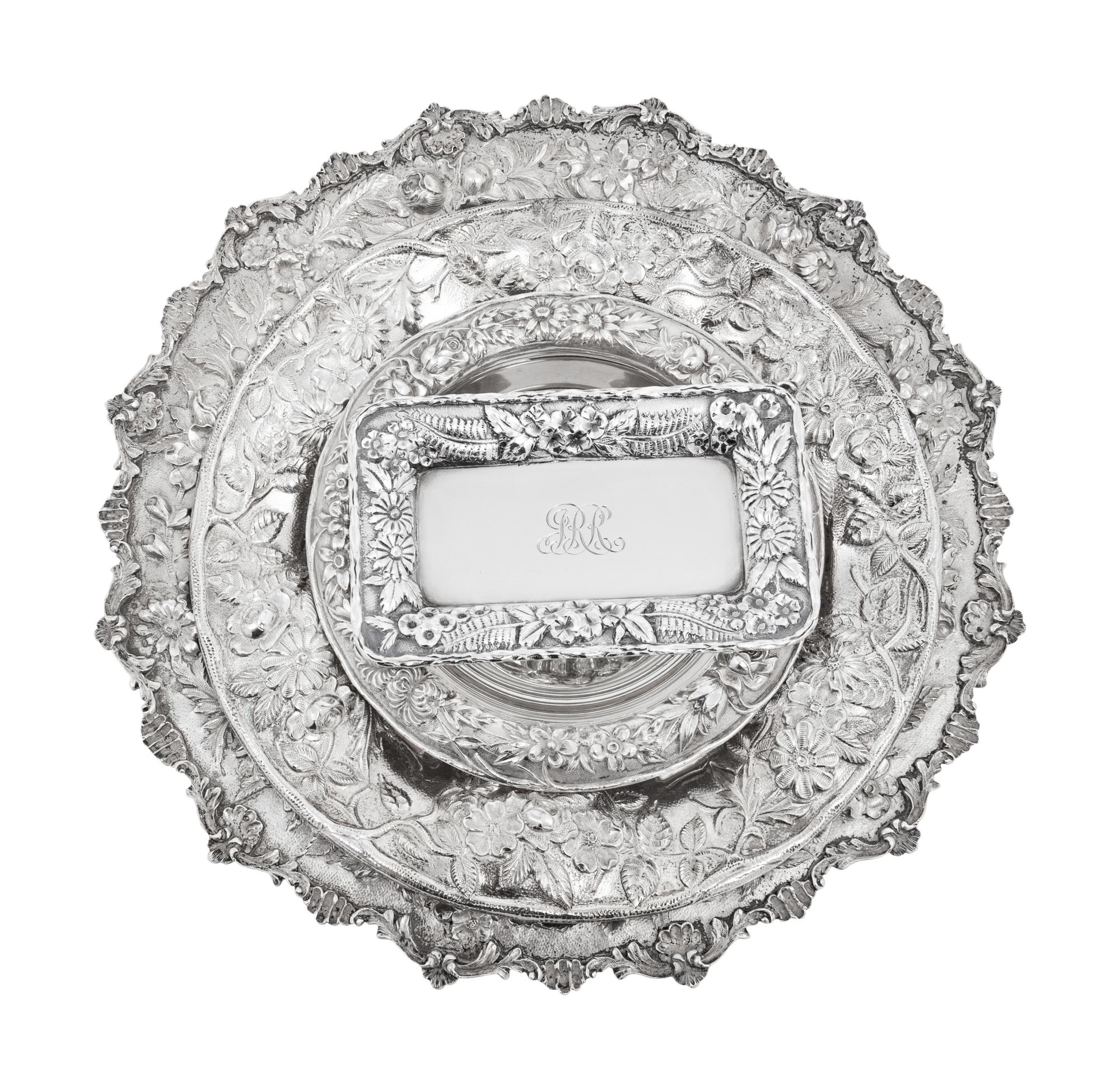 A Group of Four S. Kirk and Son Repousse Silver Table Articles