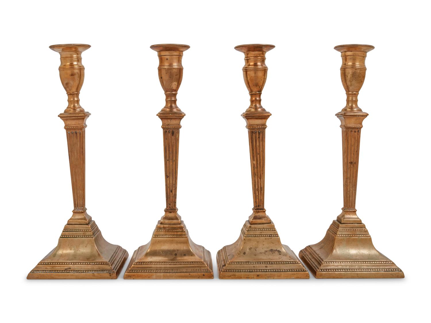 Two Pairs of English Brass or Gilt Copper Candlesticks