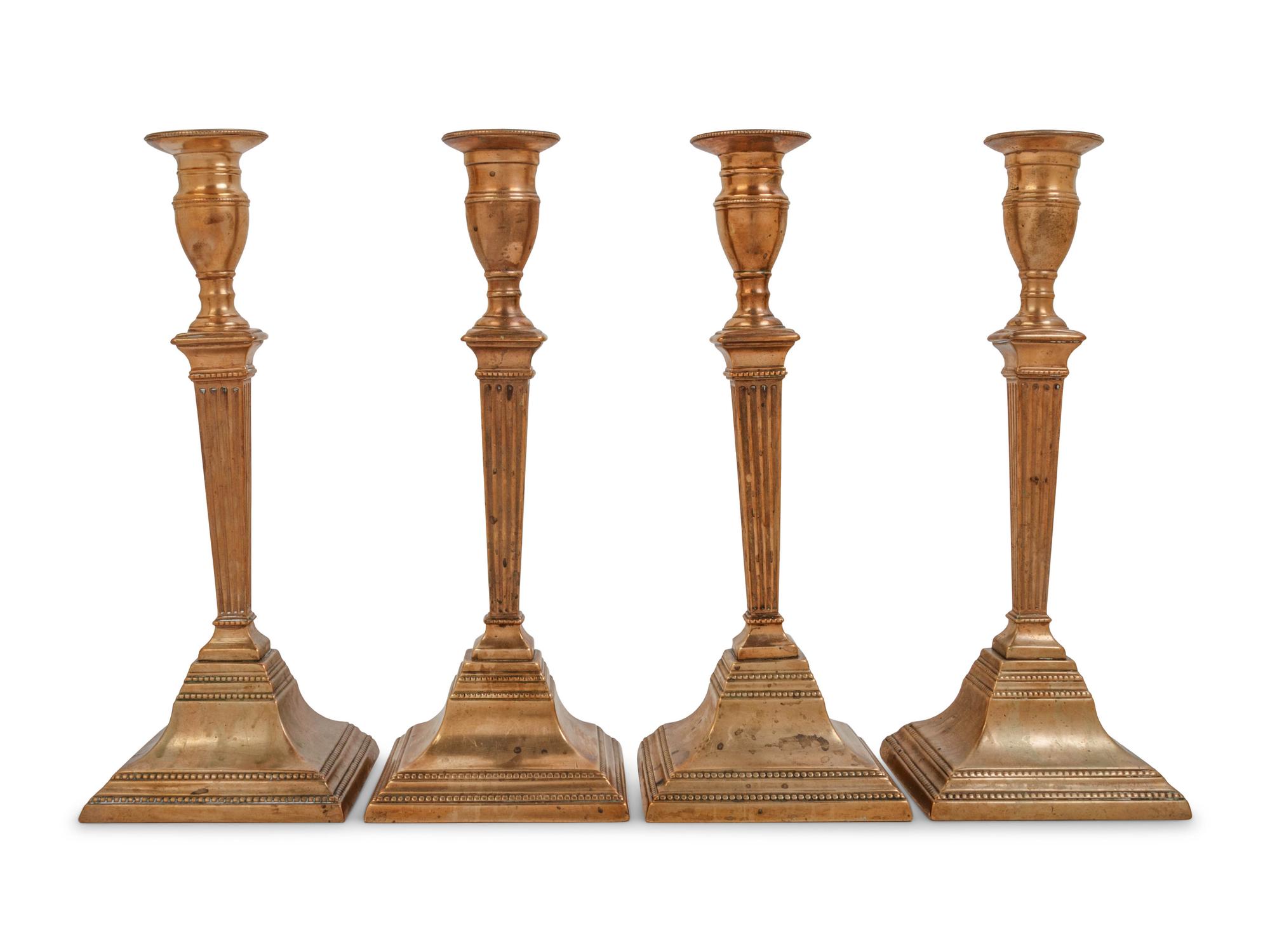 Two Pairs of English Brass or Gilt Copper Candlesticks
