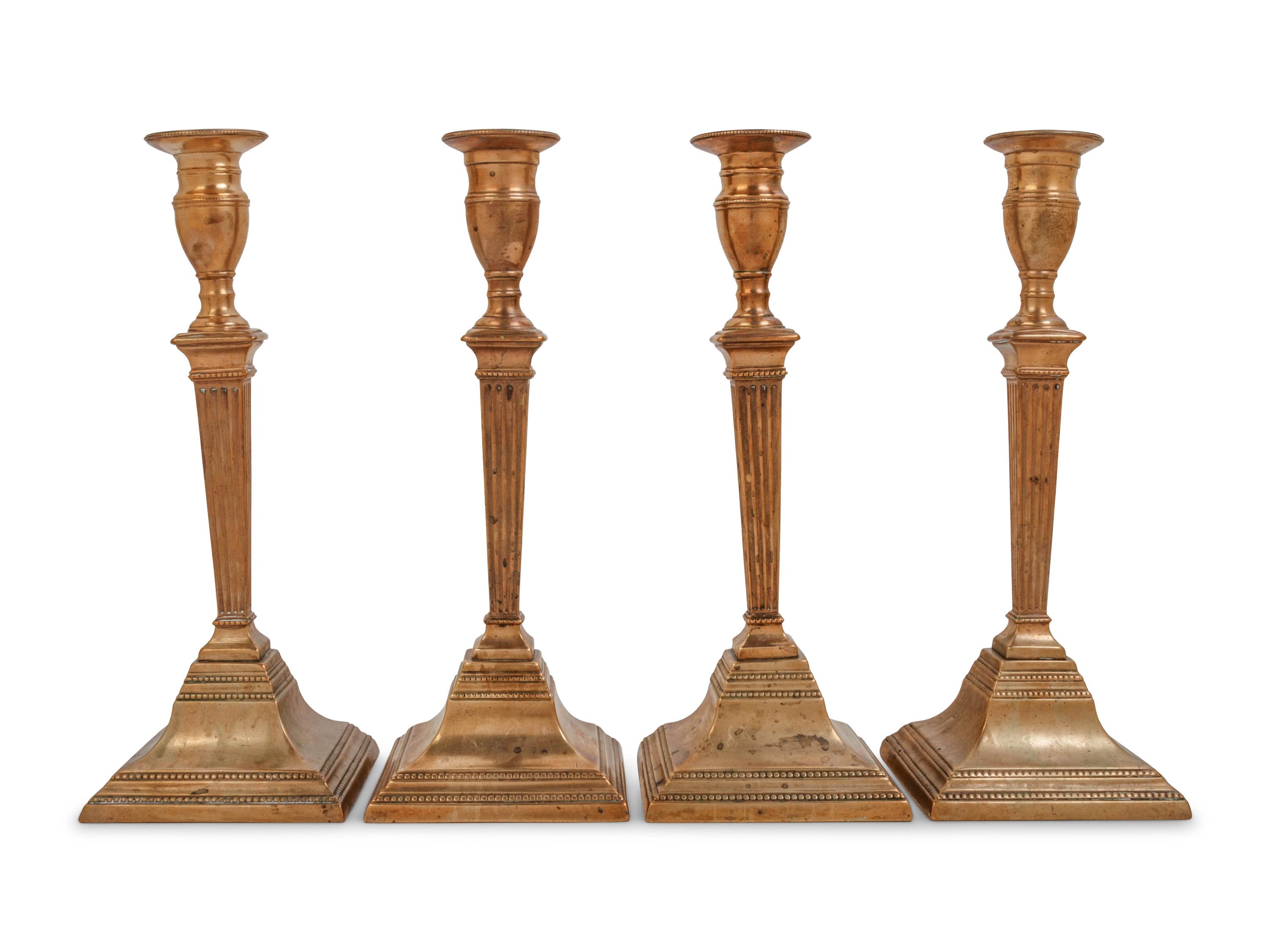 Two Pairs of English Brass or Gilt Copper Candlesticks