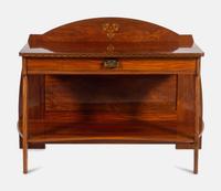 An Austrian Secessionist Inlaid Dining Suite, comprising a sideboard, a server, an extension dining table with five leaves, six side chairs and four armchairs