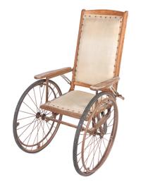 A Victorian Wheelchair Height 46 1/4 inches.