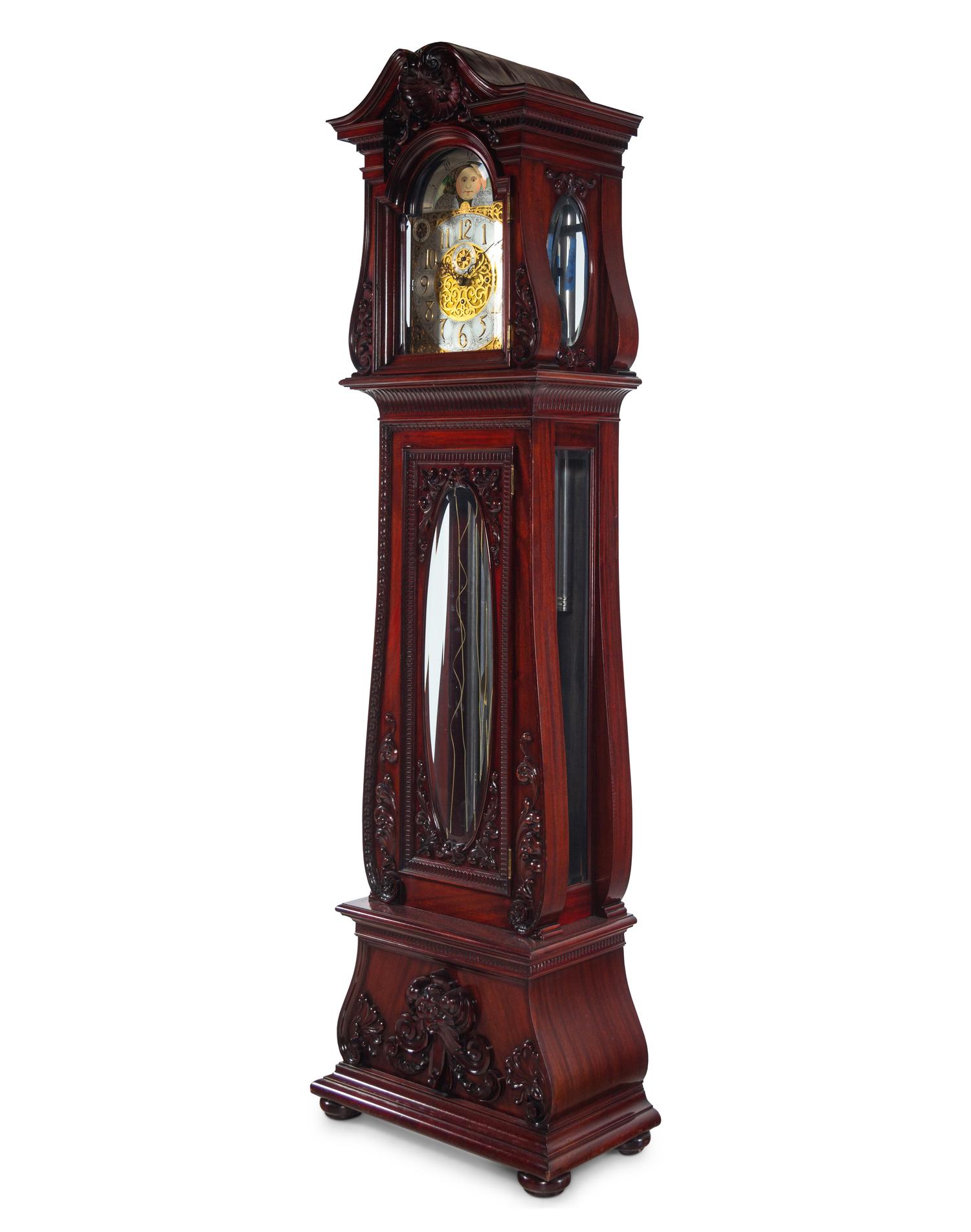 A Herschede Carved Mahogany Nine-Tube Tall Case Clock