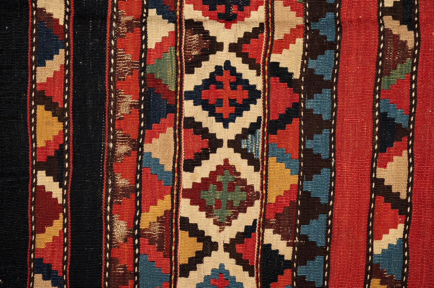 A Group of Three Kilim Rugs