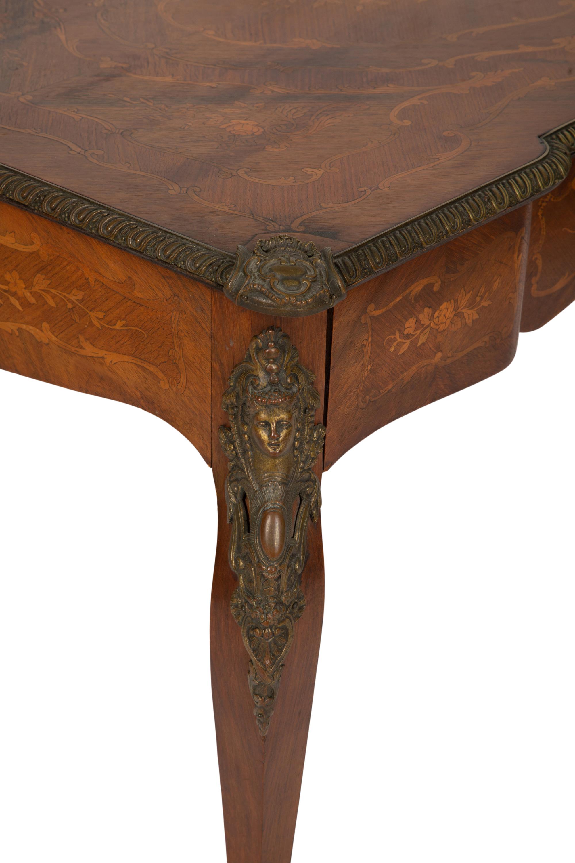 A Louis XV Style Brass Mounted Marquetry Writing Desk