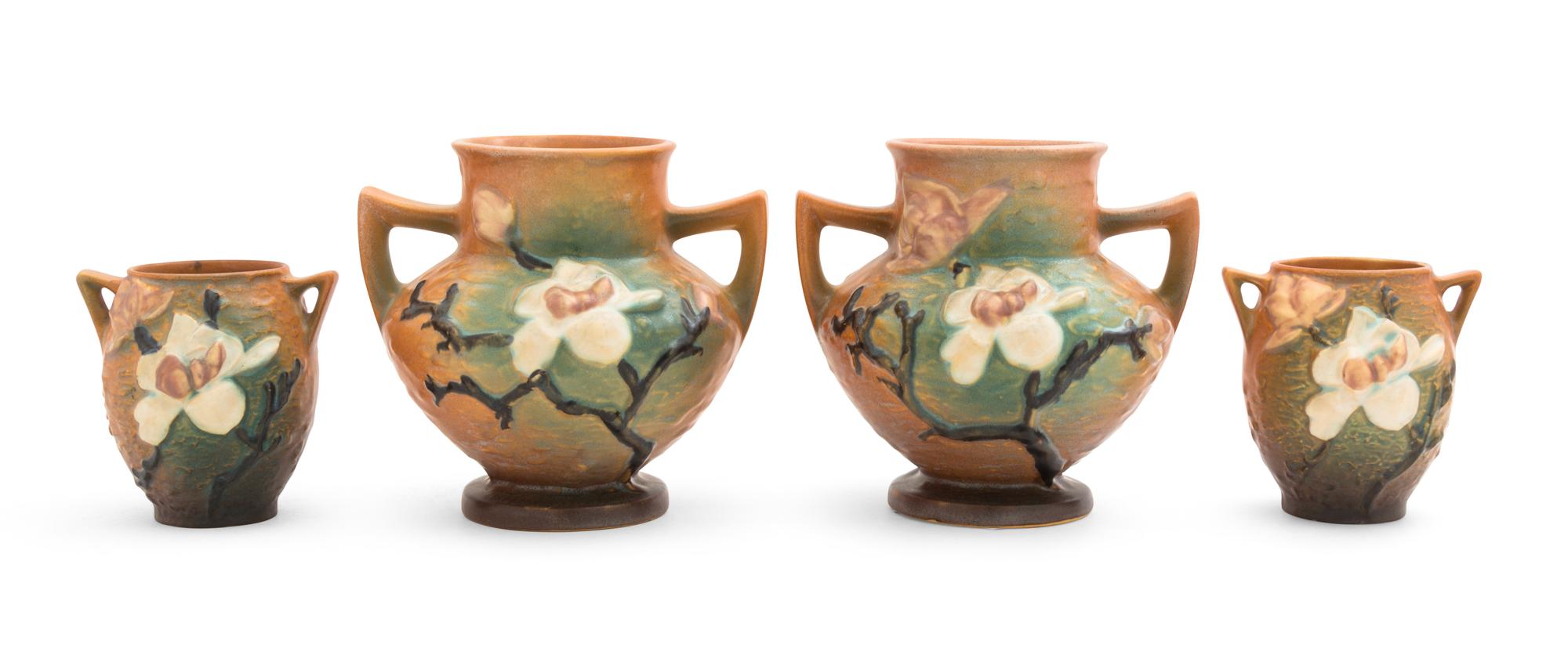 Two Pairs of Roseville Magnolia Pottery Vases Height of first pair 6 1/4 inches, second 4 inches.