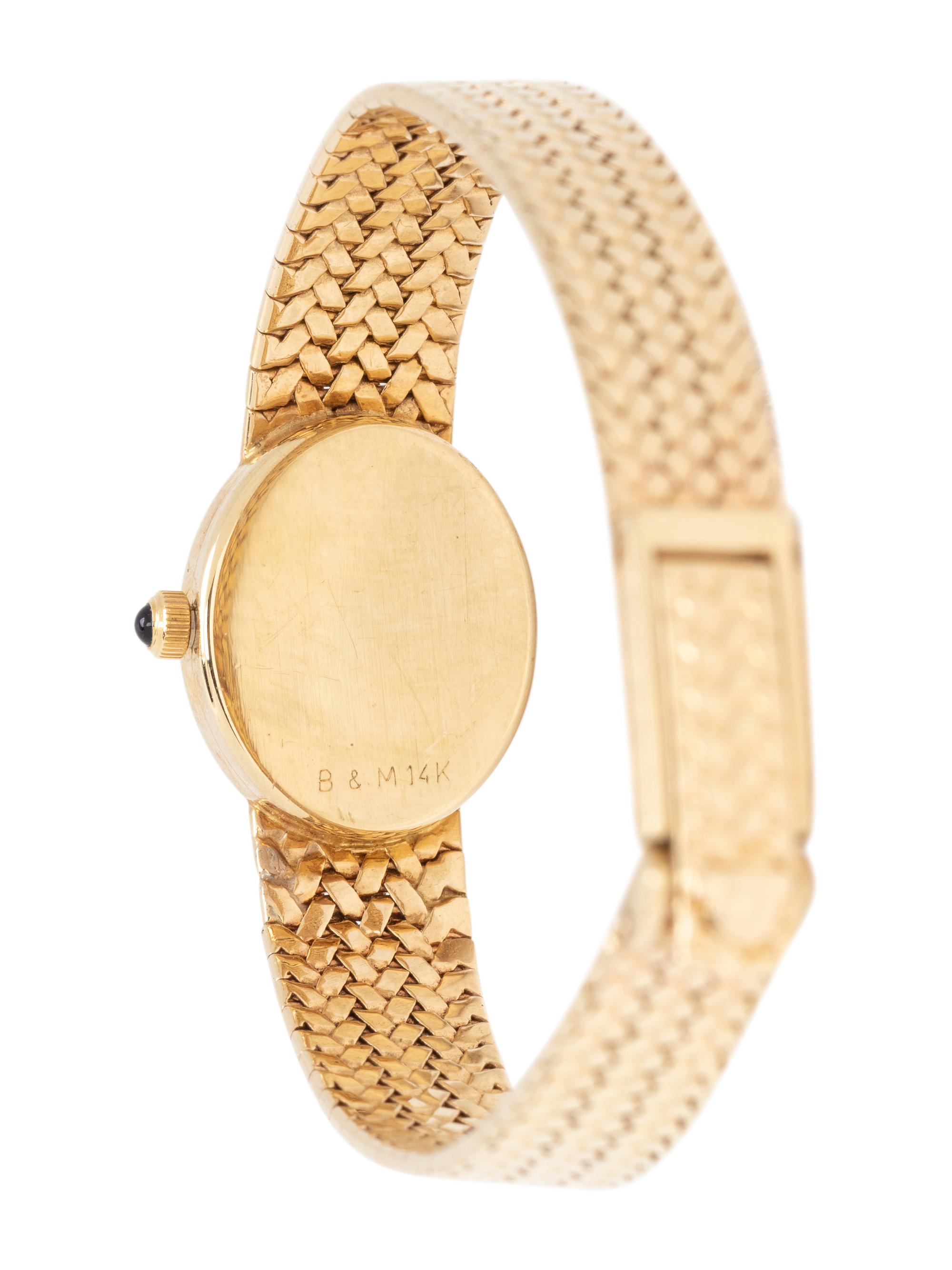 BAUME & MERCIER, TIFFANY & CO., 14K YELLOW GOLD WRISTWATCH
