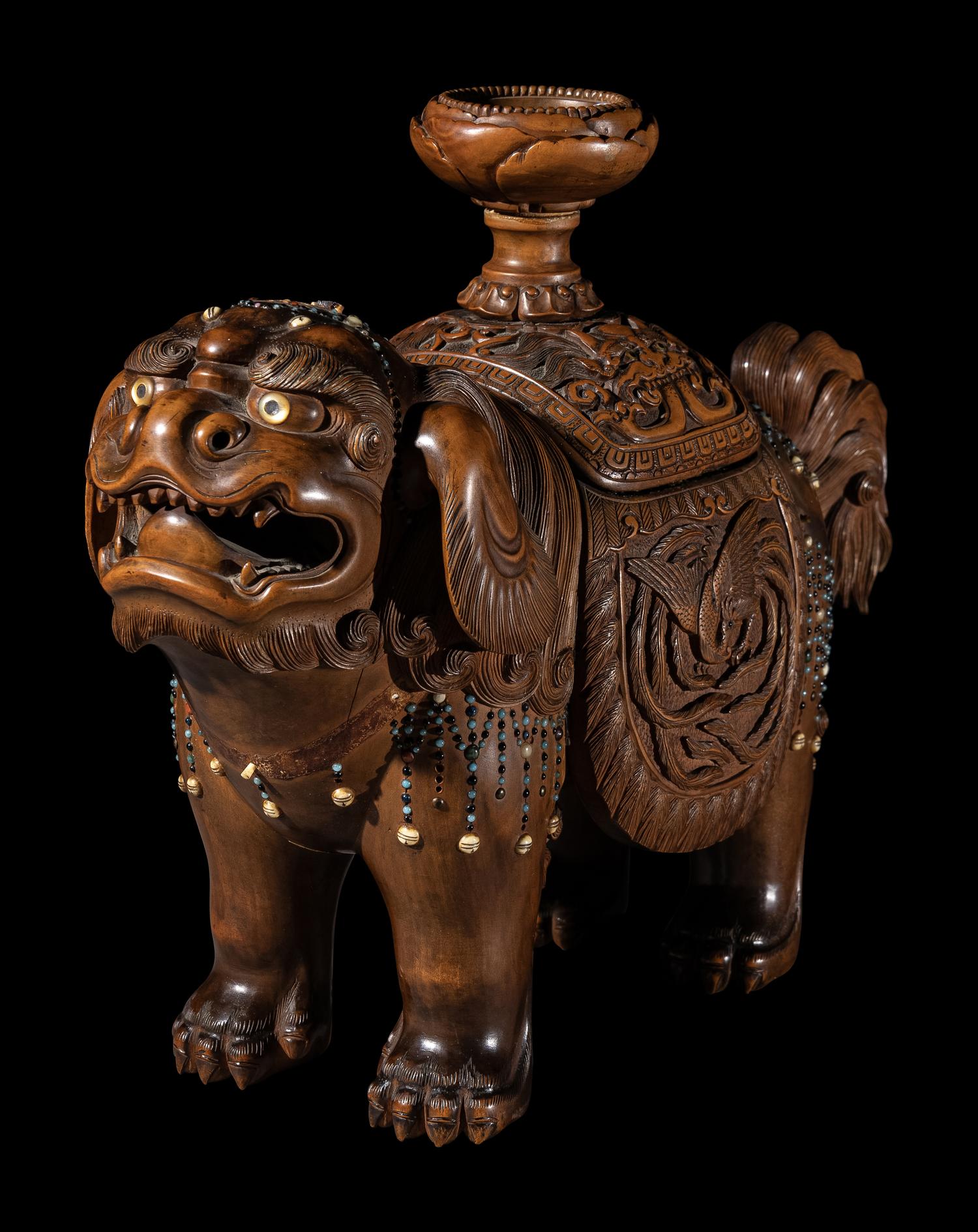 A Japanese Hardstone Inset Carved Boxwood Figure of an Shishi Lion