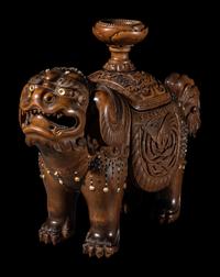 A Japanese Hardstone Inset Carved Boxwood Figure of an Shishi Lion