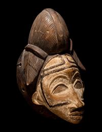 Four Punu Wood Masks