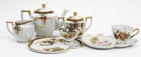 A Japanese Porcelain Tea Service Height of teapot 6 inches. — HAKUSAN CHINA, 20TH CENTURY