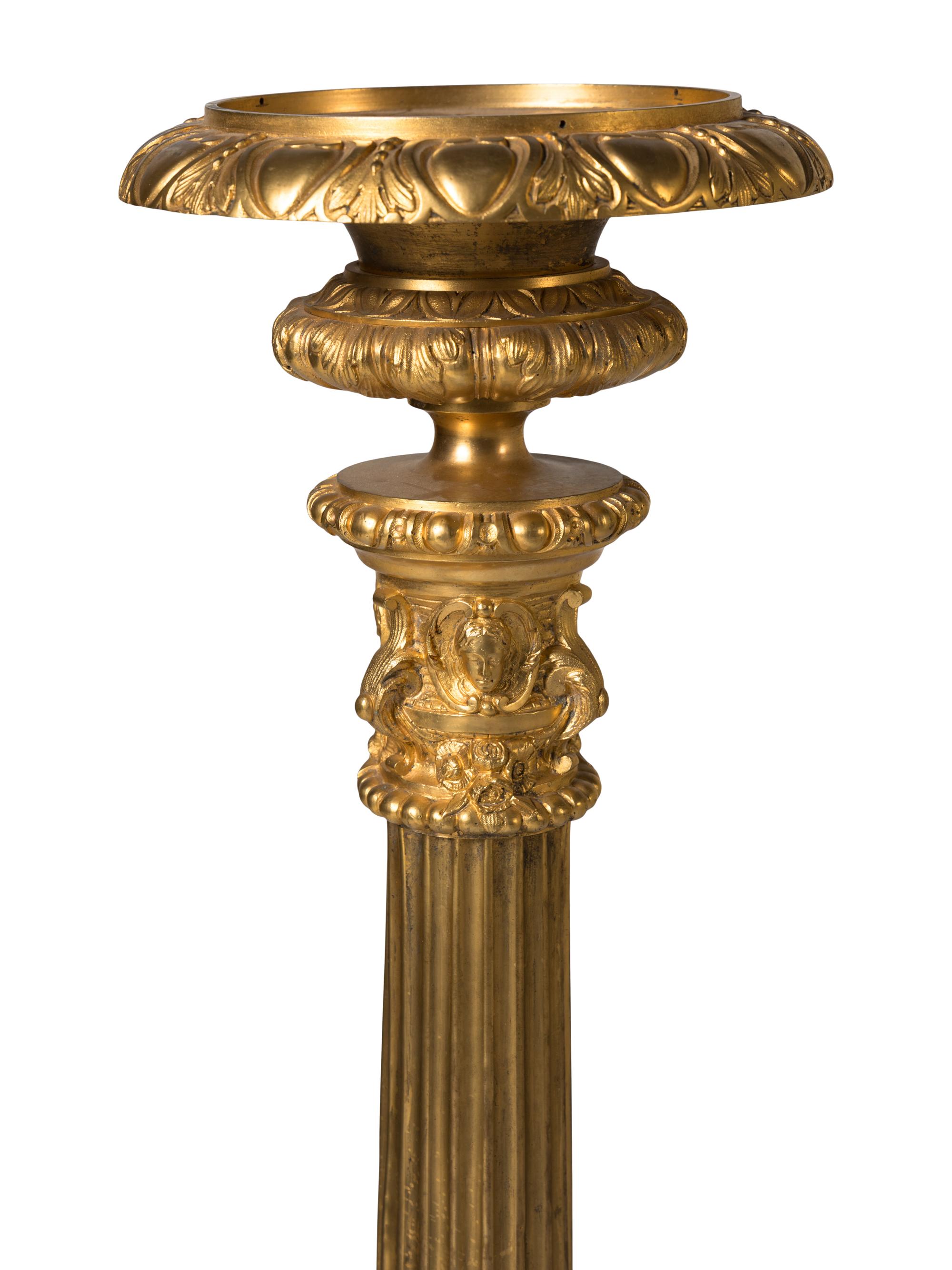 A Pair of French Gilt Bronze Torchères