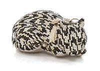 A Judith Leiber Sleeping Cat Minaudiere, 6" x 3" x 4".