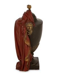 A Regency Style Painted and Parcel Gilt Cast Iron Urn