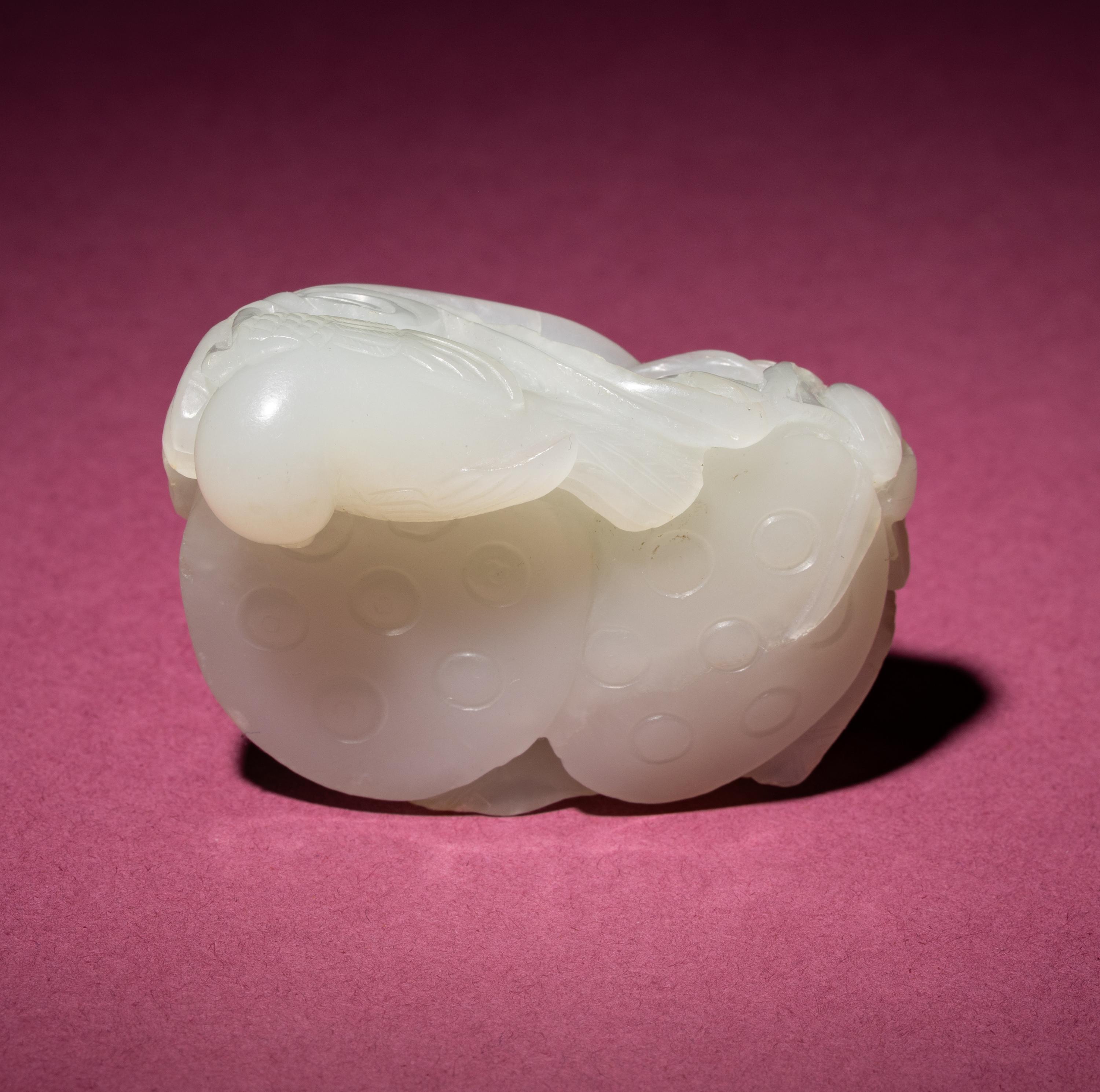 A Chinese White Jade Carving of Double Lotus Pods, 18th/19th Century — 清中期 白玉雙蓮子把件