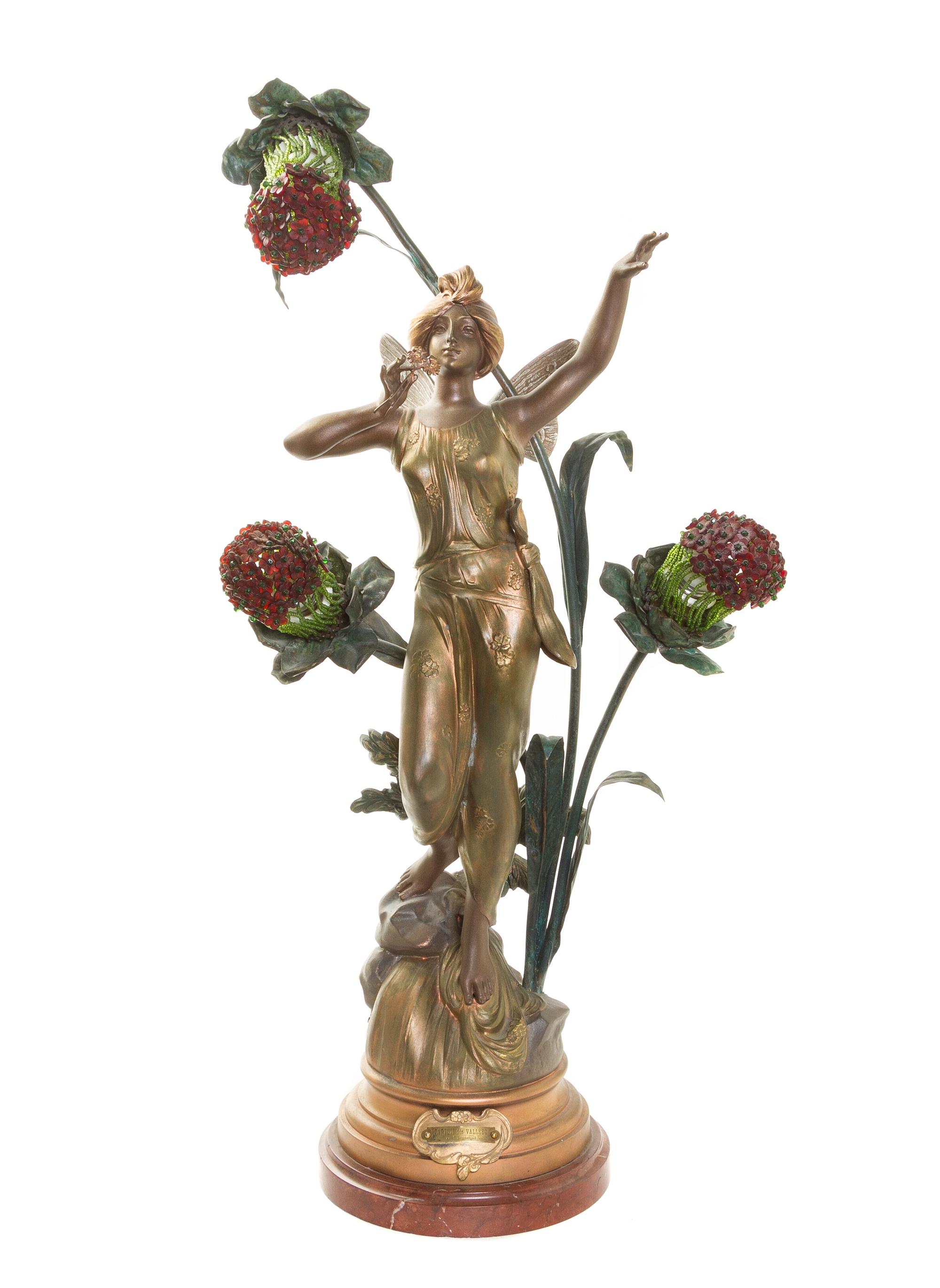 An Art Nouveau Cast Metal Three-Light Newel Post Lamp, AFTER C. BONNEFOND, Height overall 30 7/8 inches. — AFTER C. BONNEFOND,