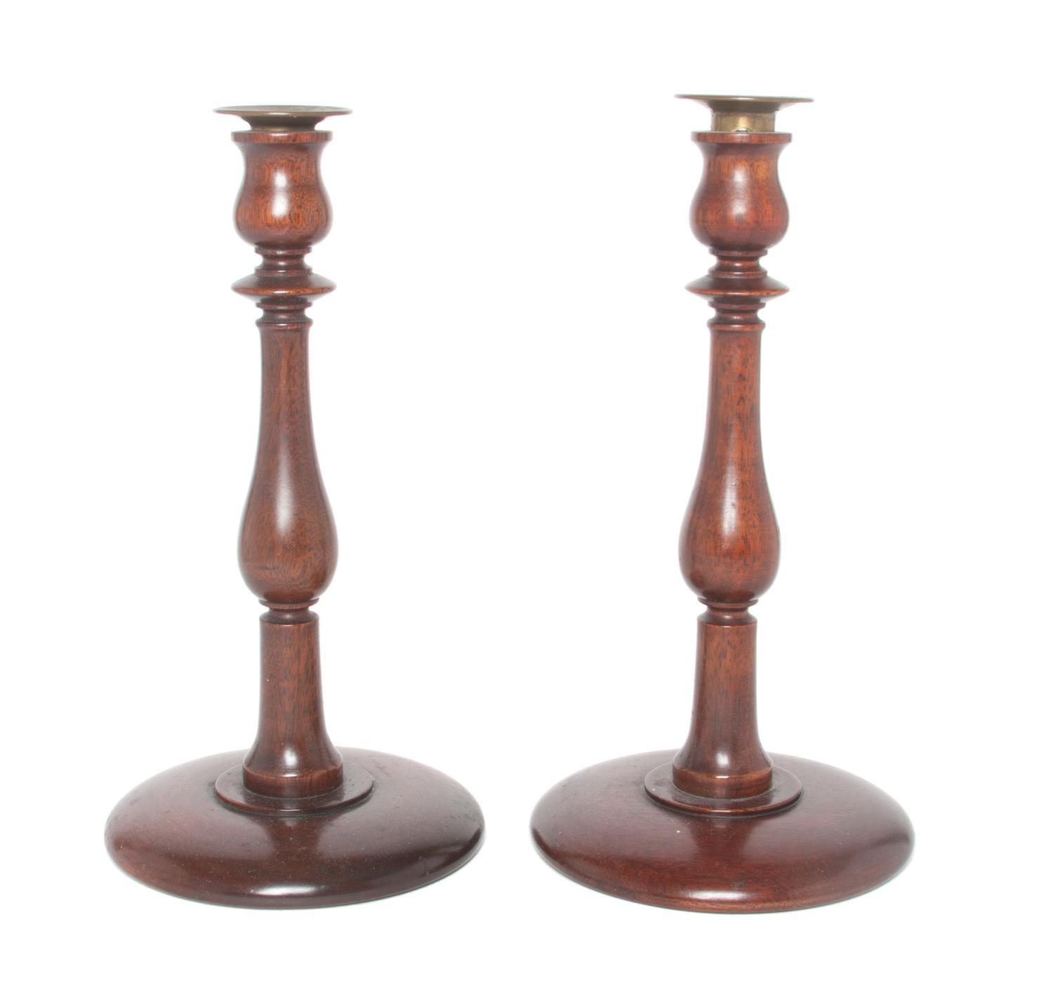 A Pair of Wooden Candlesticks Height 11 inches.