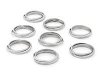 Two Cased Sets of Four Cartier Trinity Silver Napkin Rings