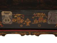 A Chinese Lacquered Trunk on Stand