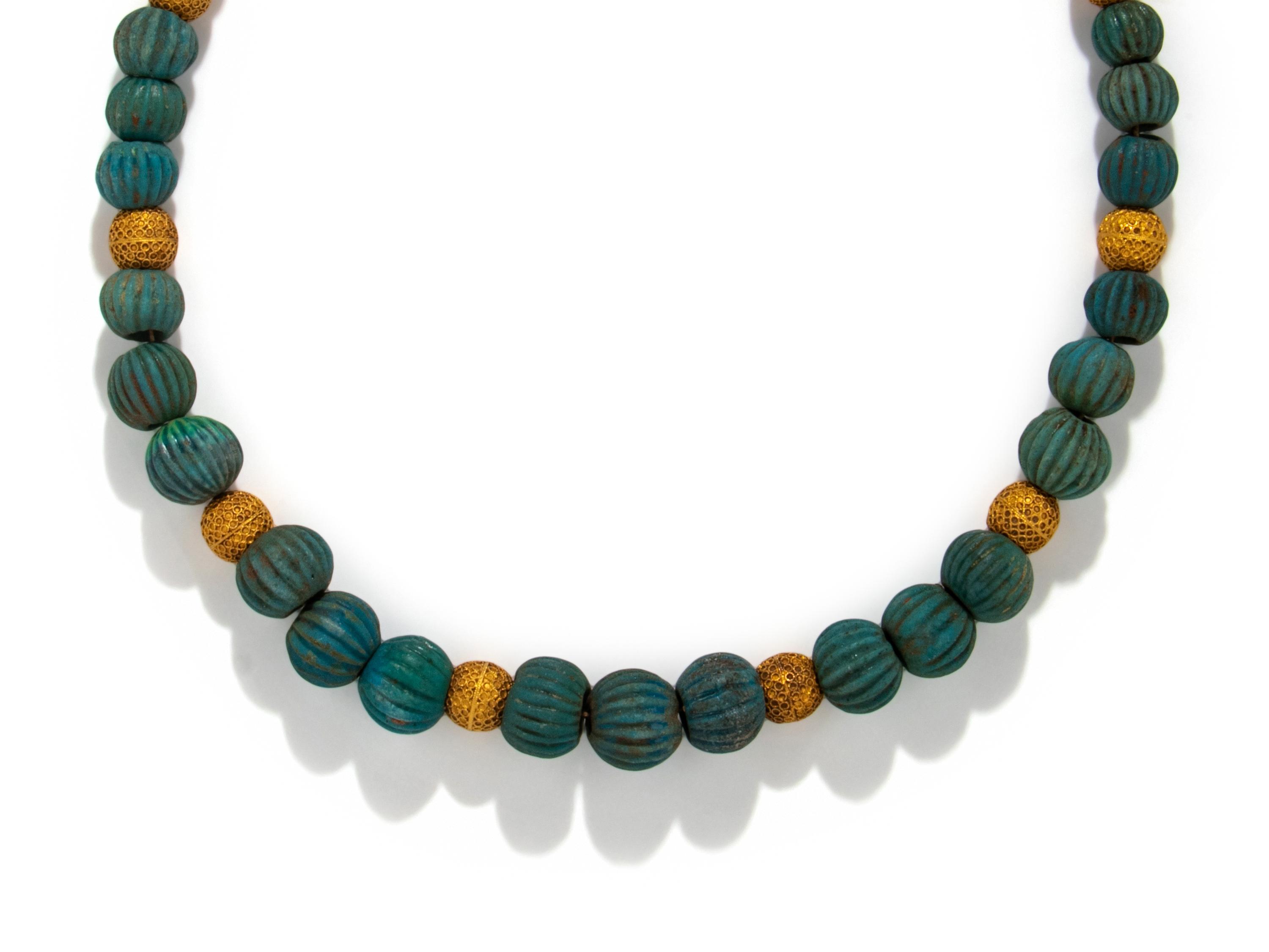 An Egyptian Faience and Gold Melon Bead Necklace