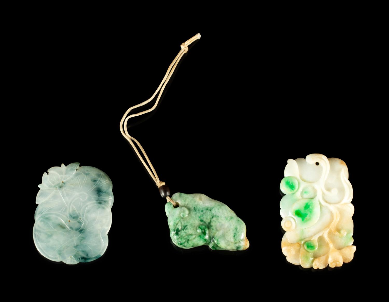 Three Chinese Carved Jadeite Pendants