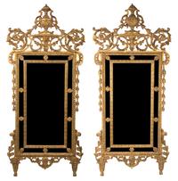 A Pair of Louis XVI Style Carved Giltwood Mirrors Height 68 x width 31 inches. — 19TH CENTURY